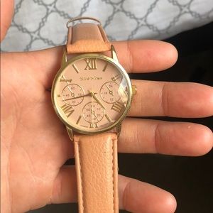 Mark Naimer peach/gold watch